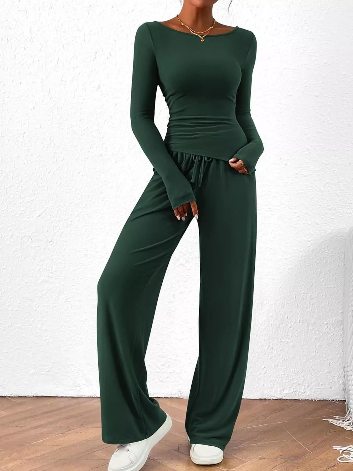 NEWYORKLISTED COMFORT COLLECTION: Long Sleeve Top and Wide Leg Pants Set: Green jumpsuit worn by a person on a white background