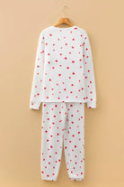 NEWYORKLISTED Intimate Apparel Collection: pajama set with red heart patterns on a beige background